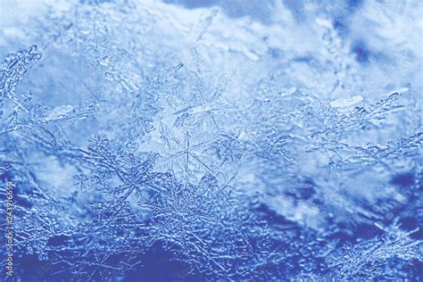 Snowflakes, winter background. Stock Photo | Adobe Stock