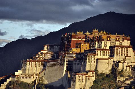 The Potala Palace in Lhasa at sunrise | Tibet, Places to visit, Places ...