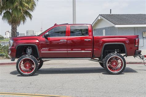 High Life Red Lifted GMC Sierra Denali | Gmc trucks, Gmc trucks sierra ...