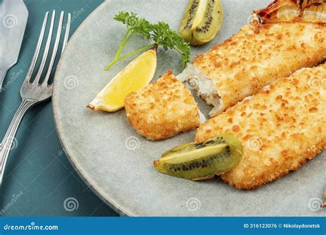 Baked Pollock Crusted Fish Fillets Stock Photo - Image of sauce, recipe ...