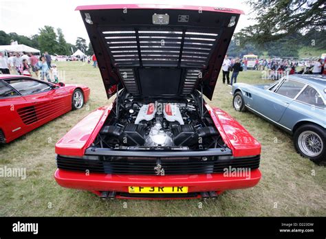 A Ferrari 512 TR (Testarossa) showing the 4.9 Litre V12 engine in all ...