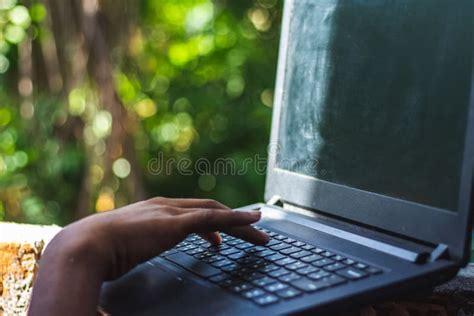 Businessman Using Laptop Computer and Working at Outdoor Park during ...