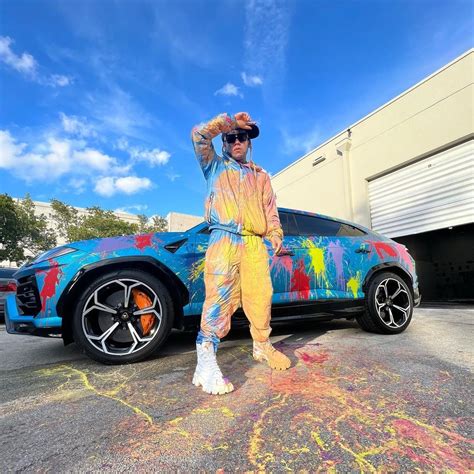 6ix9ine Introduces Paint-Splattered Lamborghini Urus, Wears Matching ...