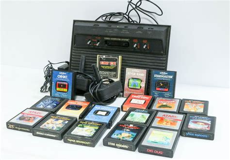 ATARI 2600 CONSOLE WITH 18 GAMES - DONKEY KONG, ET