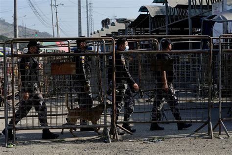 Fighting among prison gangs in Ecuador kills 18, dozens hurt