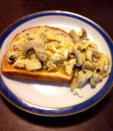 Scrambled eggs with mushrooms and spring onion