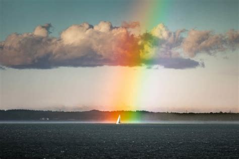 Photographer Captures Sailboat at the End of a Rainbow – Cartizzle