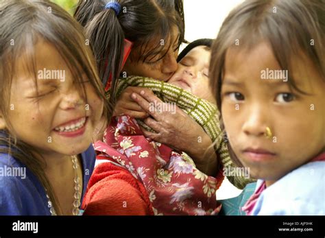 Many happy indian children making funny faces playing outdoors in India ...