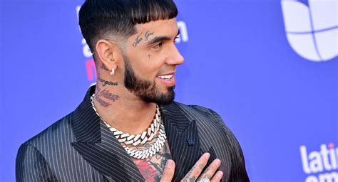 Profiting off His Ex? Anuel AA Reveals He Kept His Karol G Tattoo