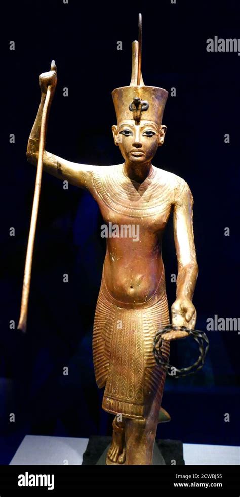 Gilded wooden statue of King Tutankhamun. 1326 BC From the tomb of King ...