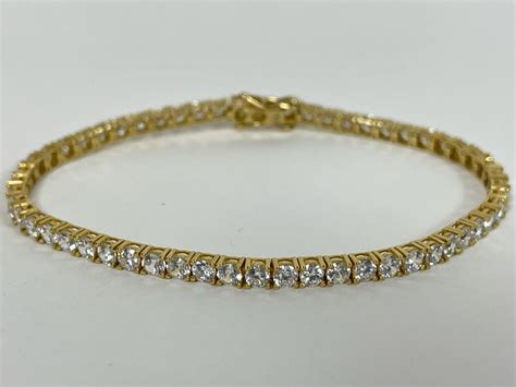 10K Gold CZ Tennis Bracelet 7L 8.1g