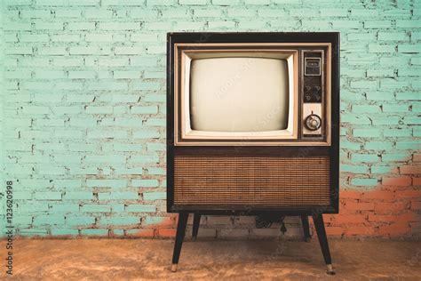 Retro old television in vintage wall pastel color background Stock ...