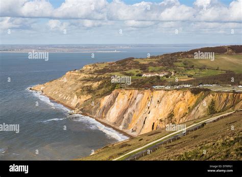 The multi-coloured Eocene sand cliffs of Alum Bay, Isle of Wight, from ...