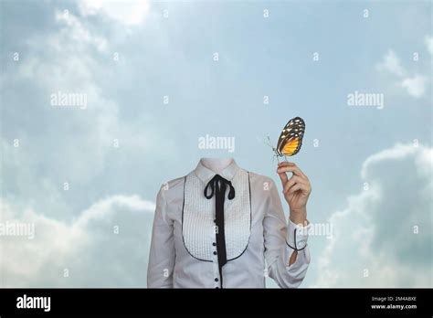 surreal headless woman with a butterfly leaning on her hand, concept of ...