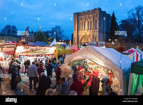 Bury St Edmunds Christmas fair, view of people looking at stalls in the ...