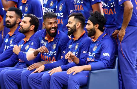 Hardik Pandya and Virat Kohli share a light moment before the match ...