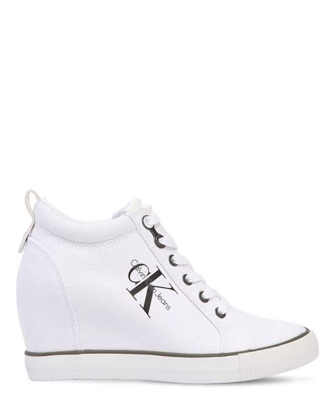 Calvin Klein 70mm Ritzy Cotton Canvas Wedge Sneakers in White | Lyst ...