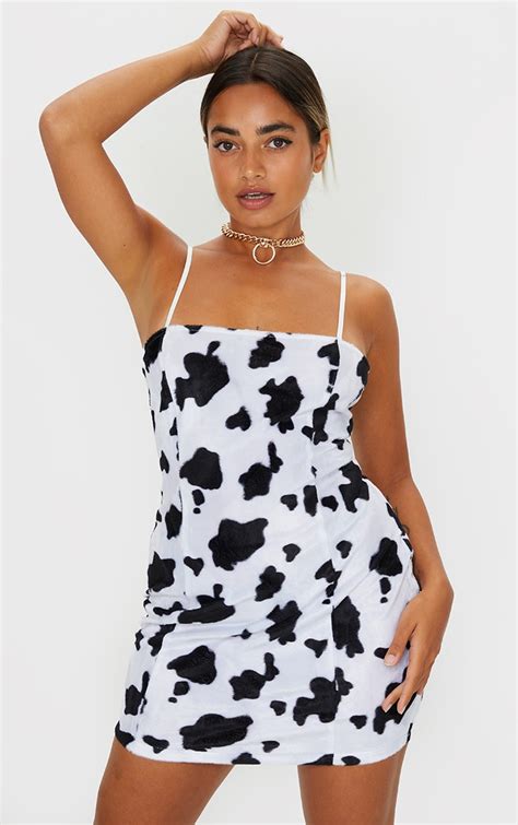 Petite Cow Print Strappy Mini Dress | PrettyLittleThing UAE