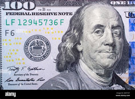 Close up of Benjamin Franklin face on 100 US dollar bill Stock Photo ...