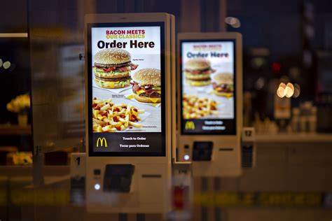 McDonald’s Finds a Flaw in Ordering Kiosks: No Cash Accepted - Bloomberg