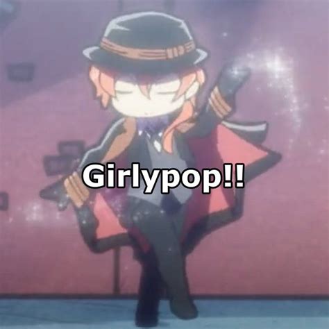 Girlypop: A Stylish Man in a Suit and Hat