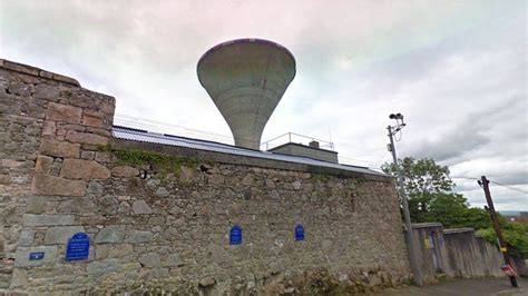 Police investigate flags on Rathfriland water tower - BBC News