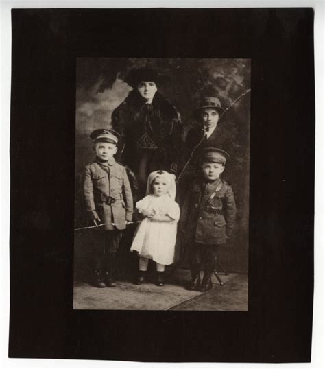 Ruth Mosko (Handler) as a baby nurse with her family in 1917! | German ...