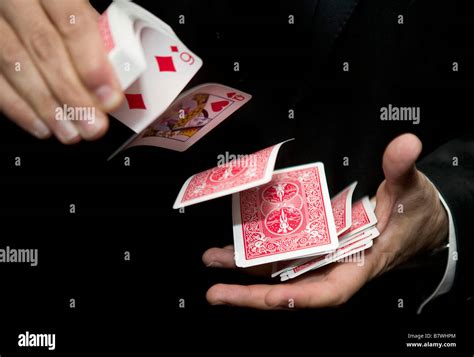 A Magician Shuffling Cards Stock Photo - Alamy