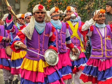 a group of people dressed in colorful costumes