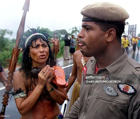 An indigenous member of the Ticuna tribe pleads with a military... News ...