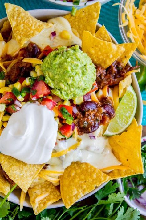 Ultimate Chili Nachos with Queso and Guacamole | Recipe | Chili nachos ...