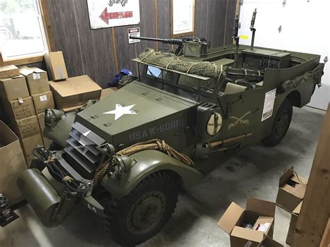 This military jeep restoration shop has all sorts of parts stocked up ...