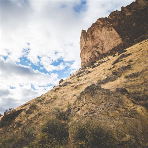 Mountain slope under snow in daylight · Free Stock Photo