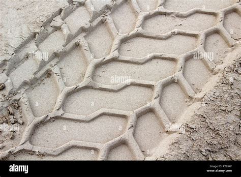 Close-up image showing the texture of tyre marks in the sand Stock ...