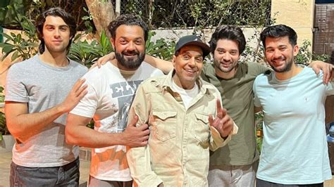 Dharmendra smiles big as he celebrates Lohri with son Bobby Deol and ...