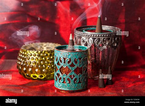 Burning aromatic incense cones Stock Photo - Alamy