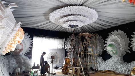 Artists making a community Durga Puja pandal ahead of Durga Puja festival