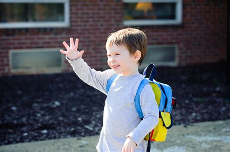 Kids Waving Goodbye At School