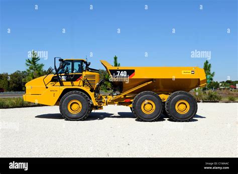 Industrial dump truck off road dirt moving equipment Stock Photo - Alamy