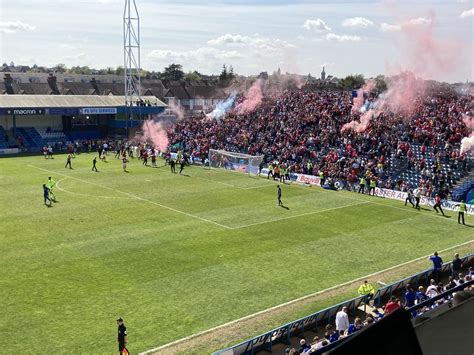 Gillingham and Rotherham United fans clash on the pitch at Priestfield ...