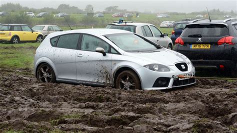 Cars stuck in mud at car park after Festival No 6 - North Wales Live