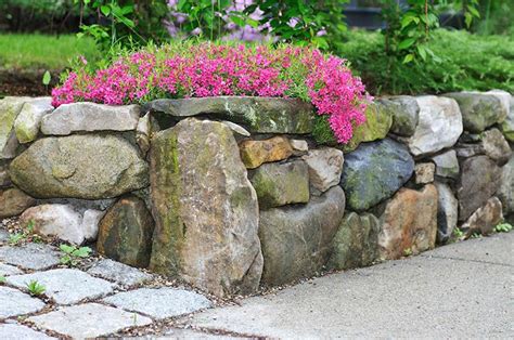 22 Practical and Pretty Retaining Wall Ideas - Trees.com | Boulder ...