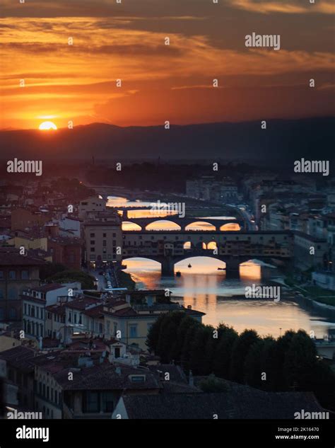 Sunset Ponte Vecchio bridge Florence Italy skyline Stock Photo - Alamy