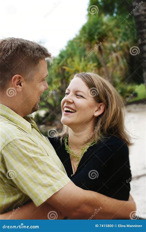 Happy couple hugging stock photo. Image of carefree, garden - 7415800