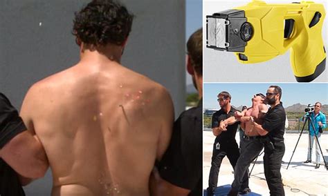 Watch a TASER in slow motion in video as volunteer spasms and howls in ...