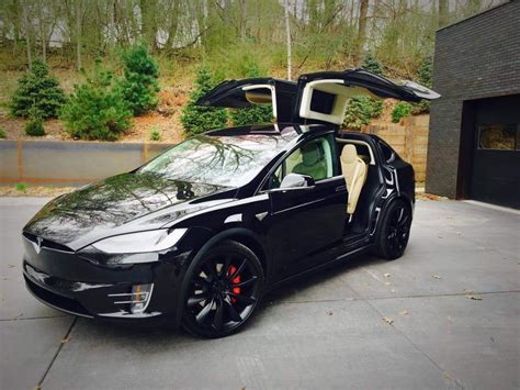 Stock 2016 Tesla Model X P90D 1/4 mile trap speeds 0-60 - DragTimes.com