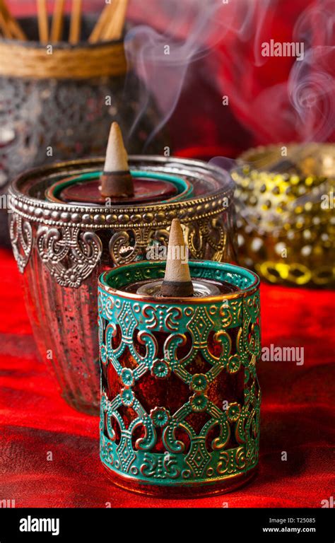 Burning aromatic incense cones Stock Photo - Alamy