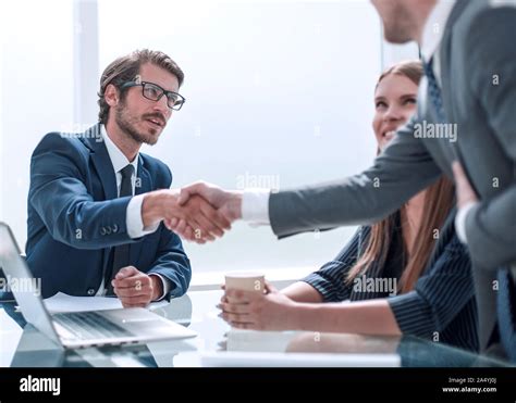 business people shaking hands during a business meeting Stock Photo - Alamy