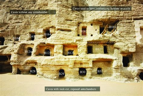 A cluster of caves in the northern section of the Mogao Caves, showing ...