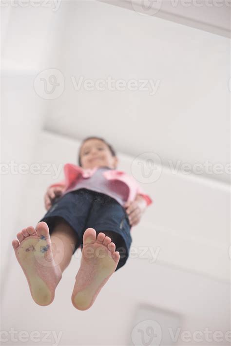 little boy standing on transparent glass floor 10400189 Stock Photo at ...